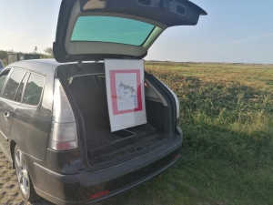 Schild am Auto
